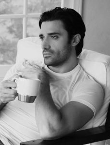 handsome man drinking coffee handsome man drinking coffee