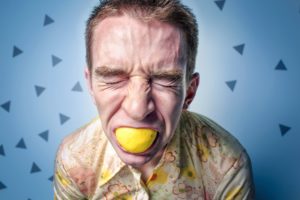 sucking on a lemon sucking on a lemon by man